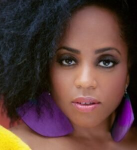 Rhonda Ross (purple earrings)